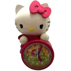Hello Kitty  battery oper clock Pink dress,bow & shoes pink poodle on clock test
